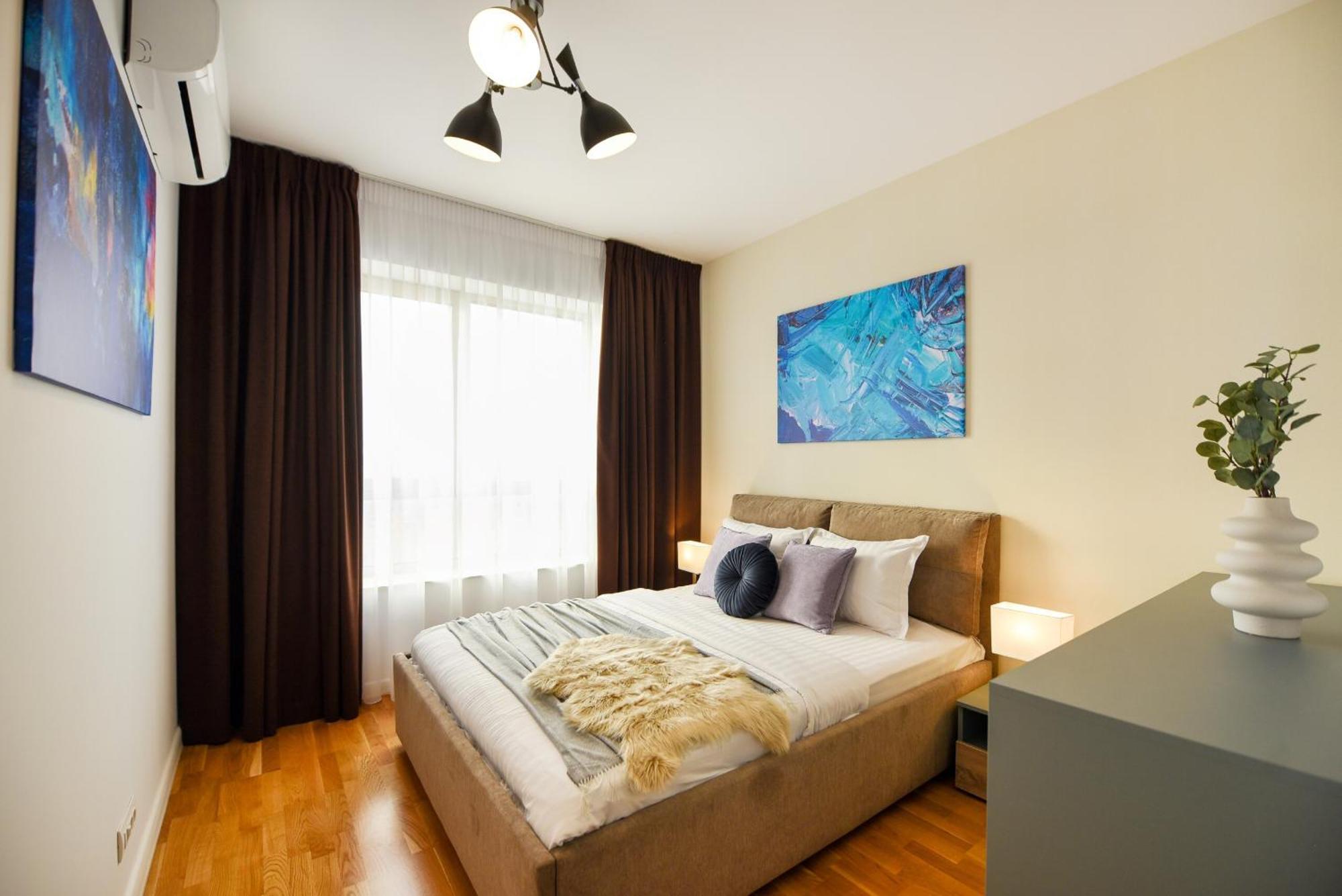 Apartment Ultimate Living Experience - Modern & Free Parking Near Romexpo