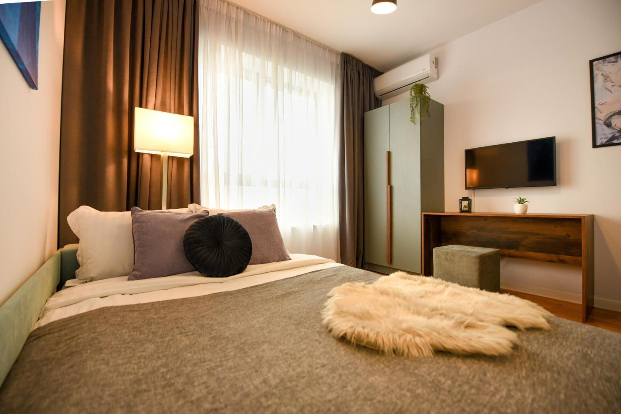 Apartment Ultimate Living Experience - Modern & Free Parking Near Romexpo